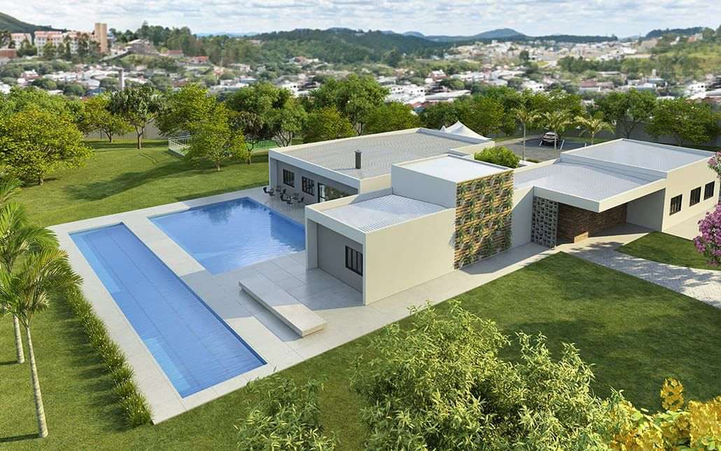 Foto aérea de parte da área de lazer, onde se visualiza as piscinas e os salões de festas, de jogos e vestiários.